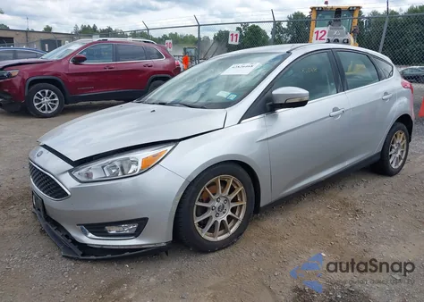 2017 Ford Focus Titanium z USA, uszkodzony, nr VIN 1FADP3N26HL316933